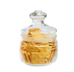 Salted crackers square shape in a clear glass jar, isolated on white background. Glass jar with square crackers.