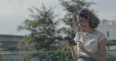 Asian teenage woman using smartphone to shop online. Women make financial transactions, transfer money via bank apps, order products. Businesswoman chatting on mobile phone. communication technology