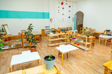 Montessori kindergarten room interior with plants