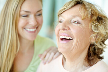 Home, senior mother and woman with laughing for joke, funny memory and connection with bonding together. Happy people, mom and adult daughter with love embrace for family, relationship and relaxing