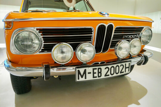 Munich, Germany, August 25, 2024: Vintage BMW 2002 Front View with Classic License Plate for Automotive Enthusiasts
