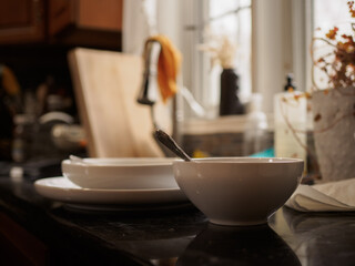Messy dishes by the sink