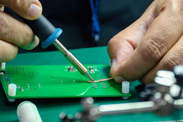 Close up scene the soldering operation by skill operator.