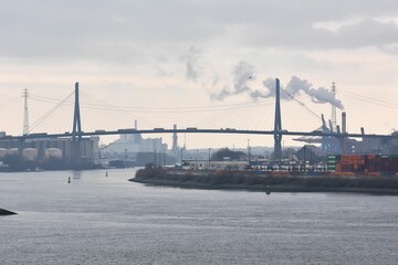 An winter impression of the port of Hamburg with the Elbe and the Köhlbrand Bridge.