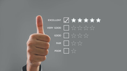 A hand giving a thumbs up next to a rating scale, symbolizing positive feedback and satisfaction in a professional setting.