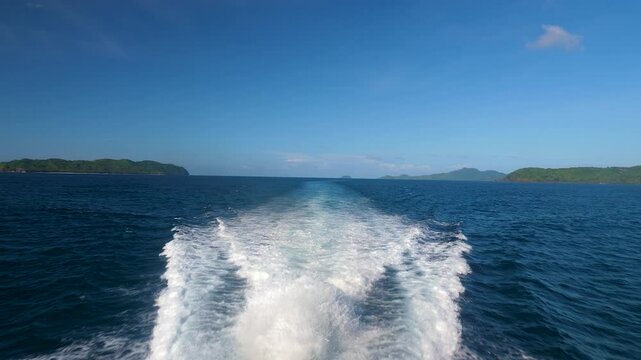 White foam on the water left by a boat going through the sea in Philippines