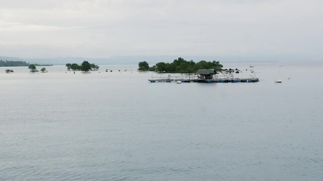 Wooden house floating on the water in the philippines