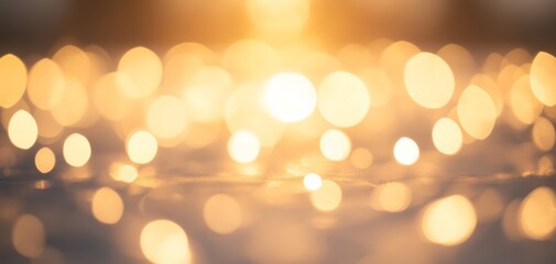 Obraz premium A serene scene featuring glimmering golden bokeh lights reflecting off a surface, creating a dreamy and tranquil atmosphere, perfect for backgrounds or artistic projects.