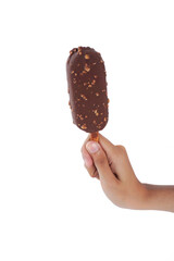 A hand holding a green and white ice cream stick