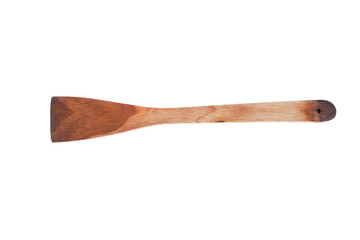 A wooden spatula with a burnt tip