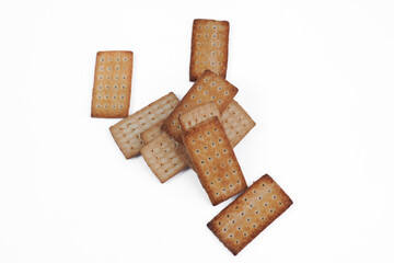 A pile of crackers with holes in them