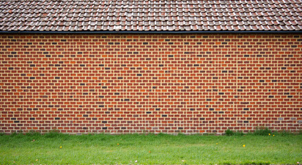 brick wall and grass