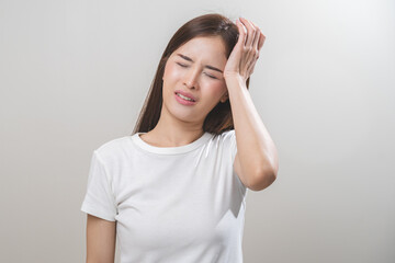 Dizzy asian young woman, girl headache or migraine pain suffering from vertigo or sick, holding head with hand, health problem of brain or inner ear not balance, standing isolated on white background.