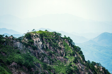 The mountainous scenery of Wu-kung Mountains in southern China in summer.