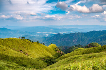 The mountainous scenery of Wu-kung Mountains in southern China in summer.