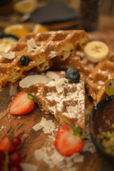 dessert of waffles and berries with caramel 