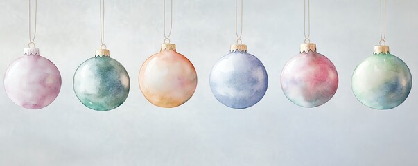 Pastel-colored Christmas baubles hanging in a row on a light background, showcasing a festive and elegant holiday decoration style.