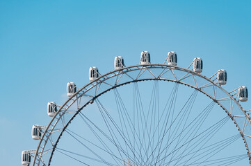 Ferris wheel under the blue sky