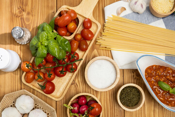 Top view of delicious food's special menu homemade preparing station of spaghetti with minced meat top tomato sauce and basil shooting placing elements serving with chef table decoration. Postulate.