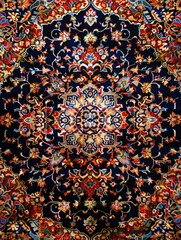 An elegant Persian rug detail, displaying a complex pattern with rich reds and navy blues, exemplifying traditional artistry.