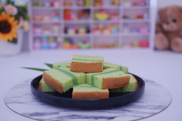 pandan cake on black plate. selective focus