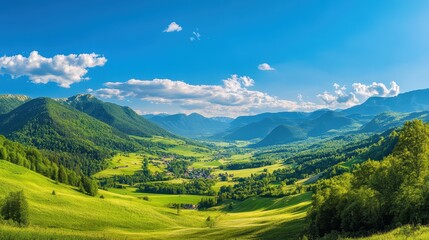 Fototapeta premium Mountain landscape with green meadows and blue sky 