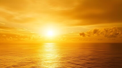 Fototapeta premium Breathtaking Golden Sunset Over the Vast Ocean with Warm Glowing Horizon
