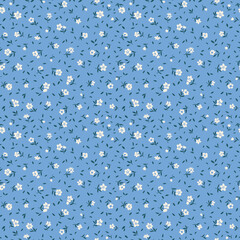 Vector seamless pattern. Vintage pattern in small flowers. Small white flowers. Blue background. Ditsy floral background. Hand drawn flowers. Abstract contemporary modern trendy pattern.