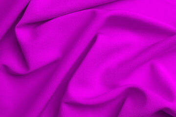 Bright thin knitted fabric with drapery, top view.	