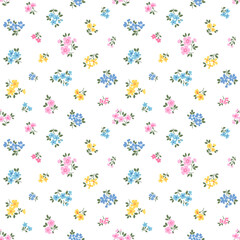 Cute floral pattern in small flowers and leaves. Delicate multicolor flowers. White background. Liberty retro print. Floral seamless background. Bright template for fashion prints. Stock