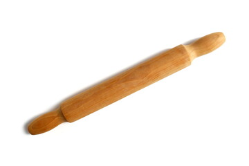 Wooden kitchen rolling pin lies on a white background.	