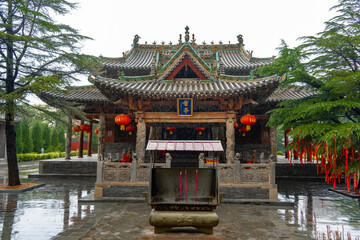 Asian Chinese historical tourist attractions, Feiyun Tower on a rainy day, a pure wooden tower...