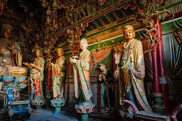 Stone statue of cross-legged Bodhisattva in Cave 18 of Yungang Grottoes, Datong, Shanxi Province