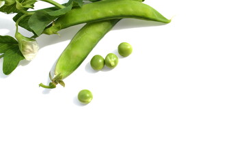 Green fresh peas lie on a white background.	