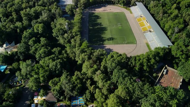 View of the football field and stadium from above. Football school stadium.
