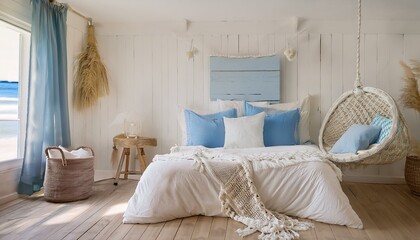 A cozy coastal-themed bedroom with light wood flooring, soft cream walls, and a white quilte
