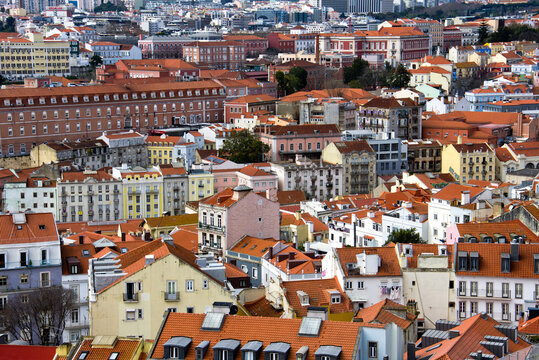 Lisbon, Portugal. Lisbon urban buildings panorama cityscape, view of colorful city buildings Portugal flag