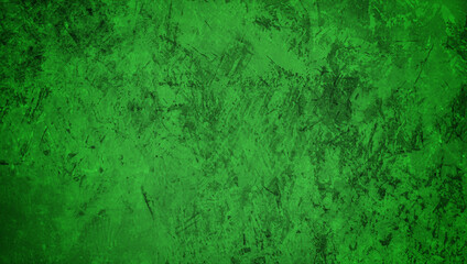 Green textured grunge background with rough and distressed surface, perfect for design, backdrop, or artistic projects.