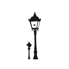 Obraz premium A black silhouette of a vintage street lamp with two light fixtures 