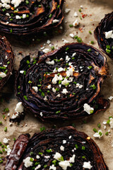Baked red cabbage steaks with herbs and feta cheese