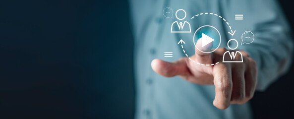 recruitment, innovation, crm, employment, executive, group, organization, select, support, team. A man is pointing at a screen with a blue background and a person in a suit.