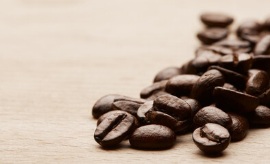 Coffee grain, ingredients and closeup on countertop at factory with quality assurance for export. Beans, texture and caffeine manufacturing with organic stock, product and mockup space at warehouse