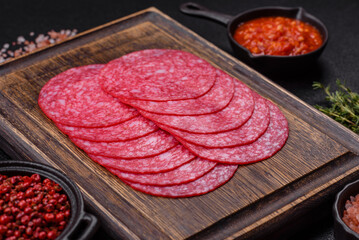 Delicious smoked salami sausage with salt, spices and herbs