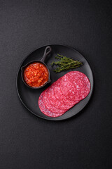Delicious smoked salami sausage with salt, spices and herbs