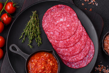 Delicious smoked salami sausage with salt, spices and herbs