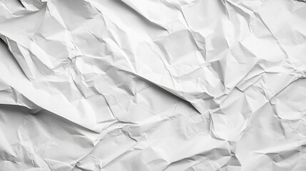 Fototapeta premium A close-up shot of crumpled white paper with texture and creases.