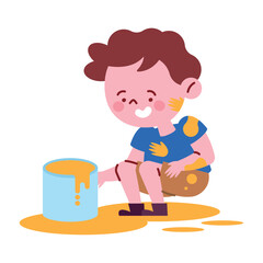 smiling boy holds with bucket of paint