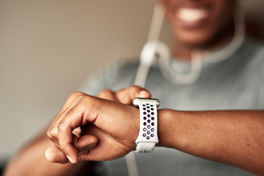 Man, hands and fitness watch for pulse, workout gear and tracking steps on app at gym. Male person, sports accessory and exercise to monitor heartbeat, cardio results and digital clock for timer