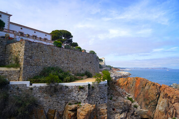 view from the famous Camí de Ronda hiking trail along the coast of the Mediterranean Sea at S'Agaró towards Palamos, Platja d'Aro, GIrona, Costa Brava, Catalonia, Spain