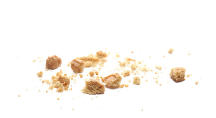 Biscuit, pile crumbs isolated on white, side view
